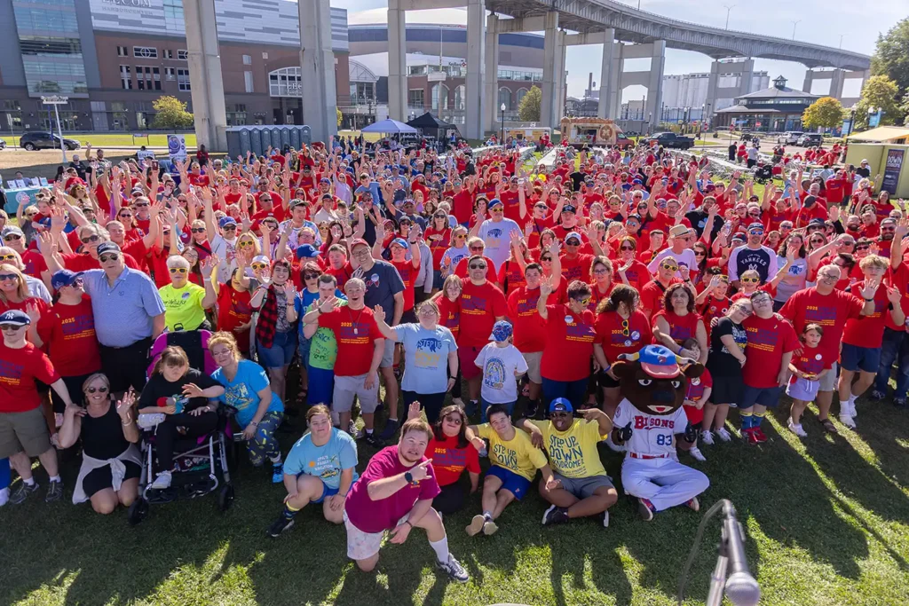 Step Up for Down syndrome participants gathering to celebrate Down syndrome awareness and show their support for the Down syndrome Parent Group of WNY